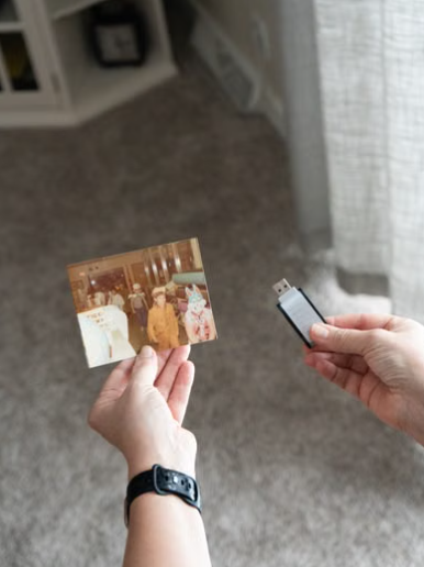 A preservation plan connects a labelled keepsake with organized files, two backups, and its family story.